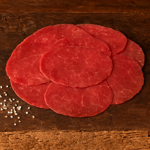 Rundercarpaccio van Pure Meat & Co, dun gesneden rundercarpaccio op een bord