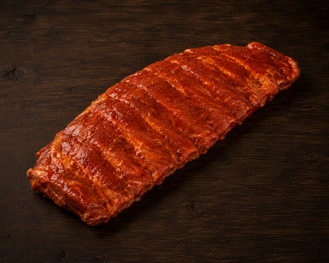 Voorgegaarde Spareribs van Pure Meat & Co, voorgegaarde spareribs op een snijplank